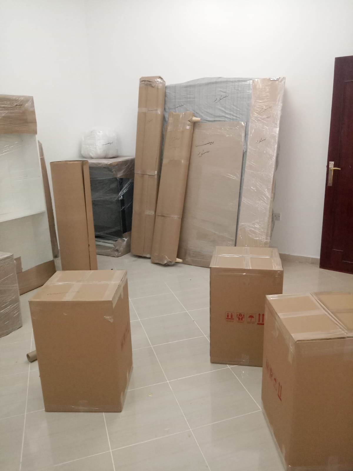 House moving team carrying boxes during a residential relocation
