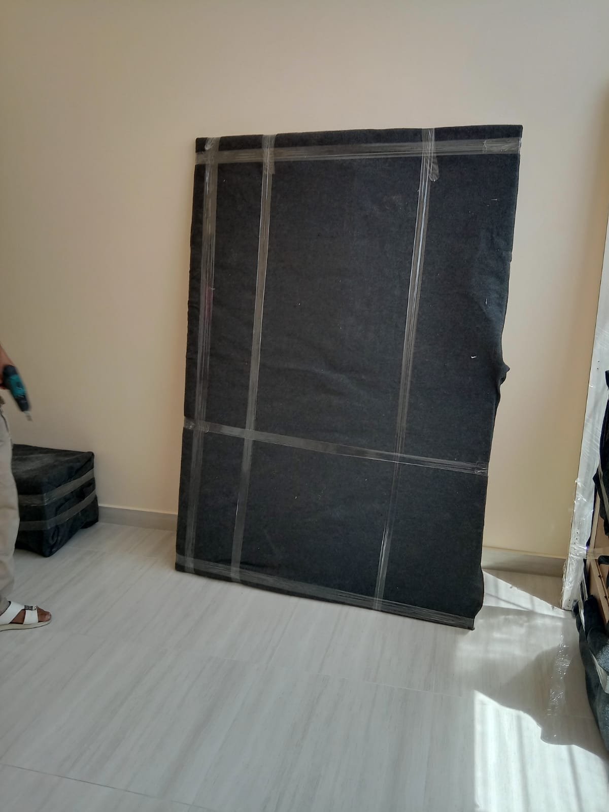 House movers handling furniture with care during a home relocation